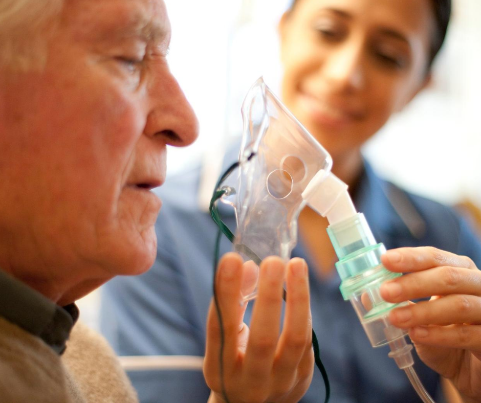 man using nebuliser
