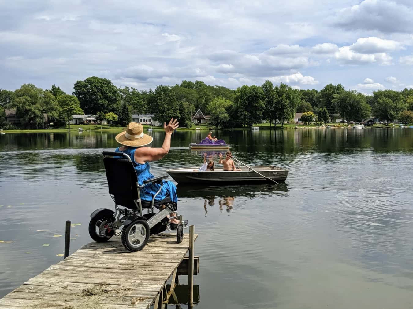 Woman in EagleHD Electric Wheelchair on jetty