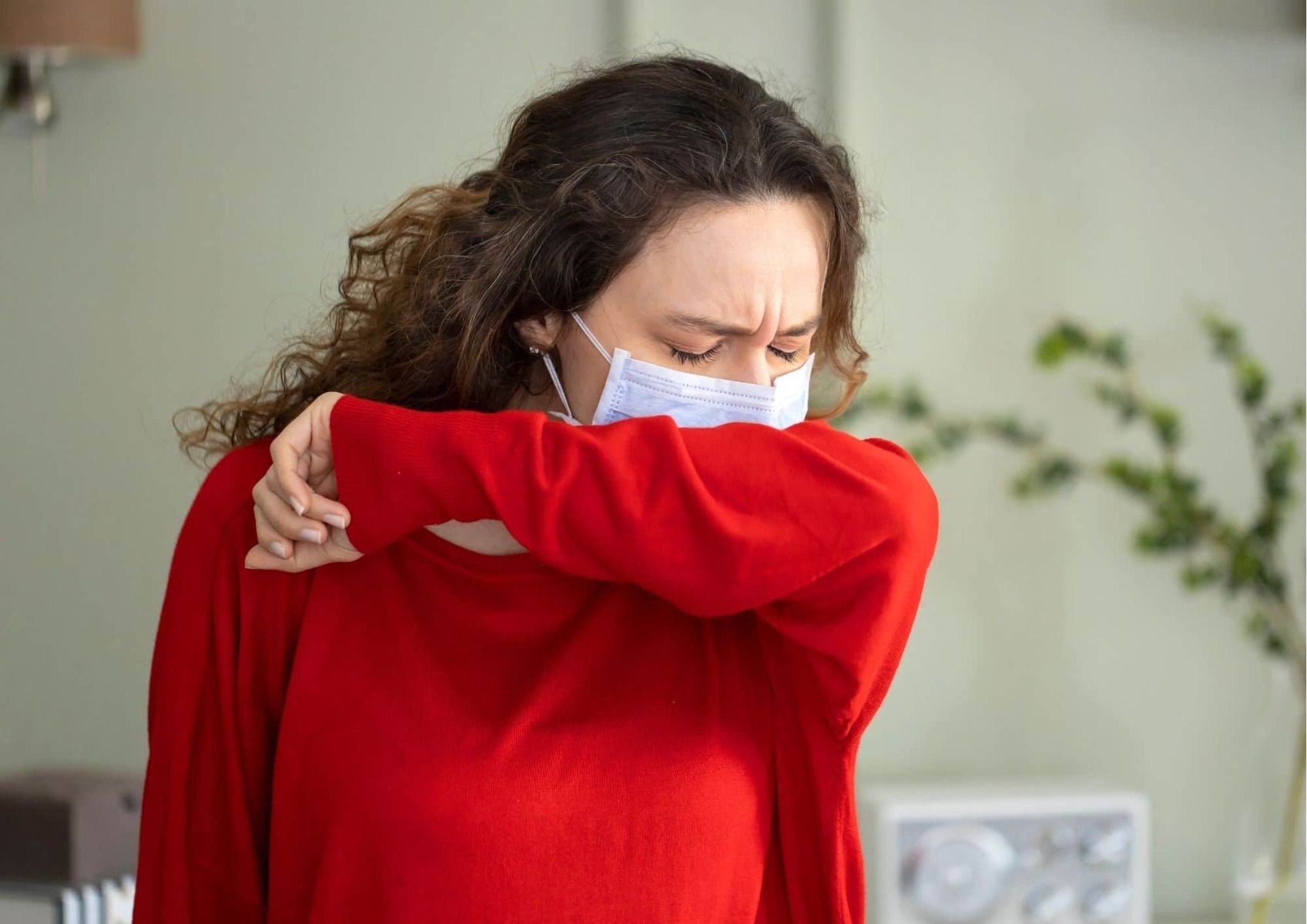 coughing in elbow to prevent covid contamination